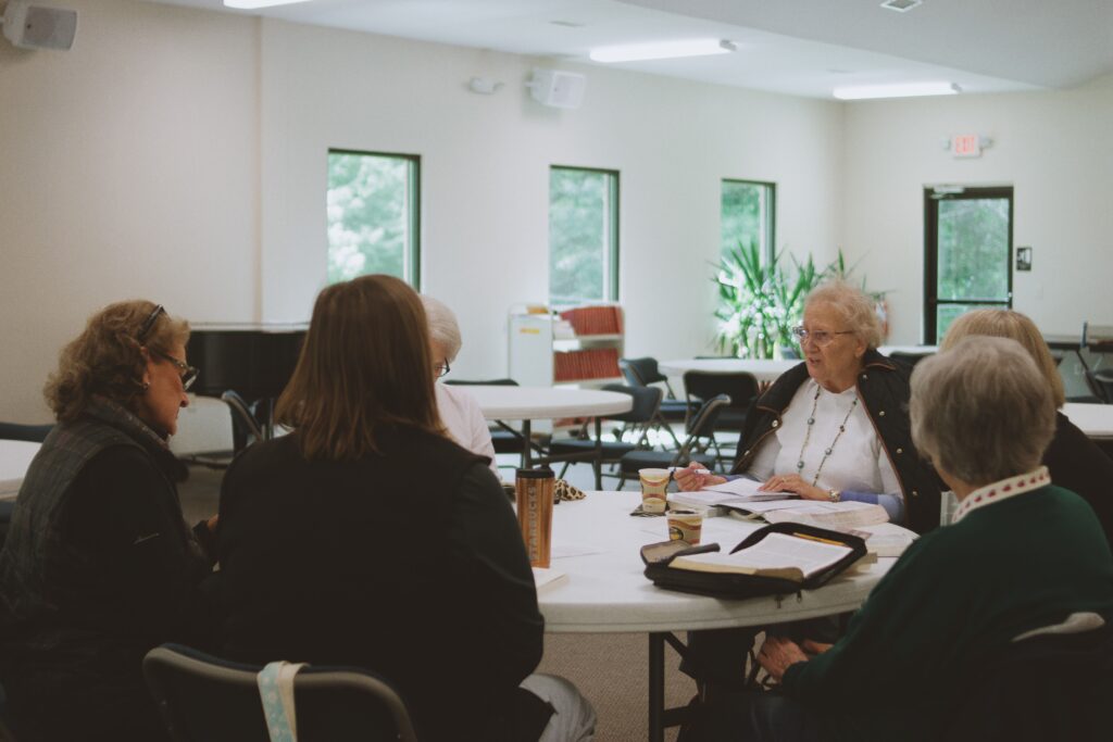 Older adults taking part in a community activity together